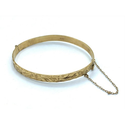 134 - 9K Yellow Gold Bangle with full hallmark inside band, weight 11.7g and 62mm diameter approx