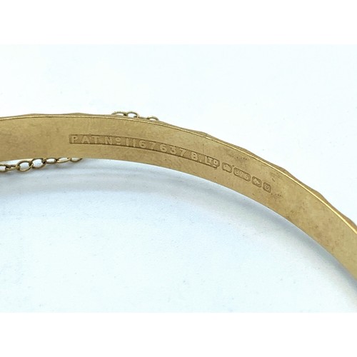 134 - 9K Yellow Gold Bangle with full hallmark inside band, weight 11.7g and 62mm diameter approx