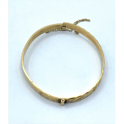 134 - 9K Yellow Gold Bangle with full hallmark inside band, weight 11.7g and 62mm diameter approx