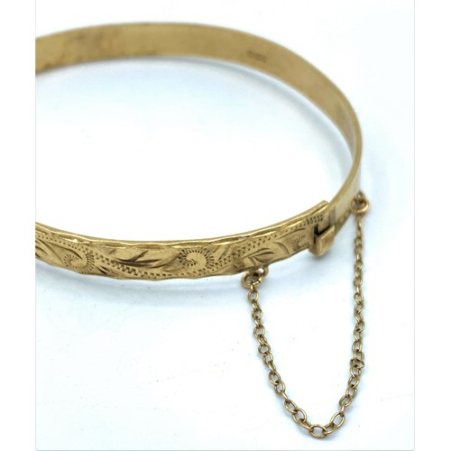 134 - 9K Yellow Gold Bangle with full hallmark inside band, weight 11.7g and 62mm diameter approx