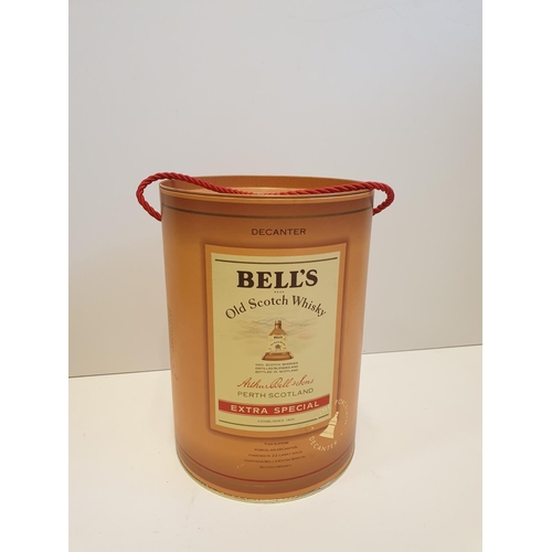 199 - Bells Scotch Whisky Decanter by WADE in original cylindrical carton , 22x16cm