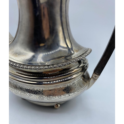 30 - Silver Coffee Pot made in London 1904. weight 706g and 21cm tall