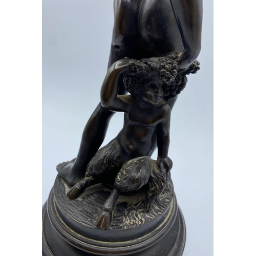 89 - Antique Bronze Statue of Athletic Youth and Child, weight 3.5kg and 33cm tall including wooden base