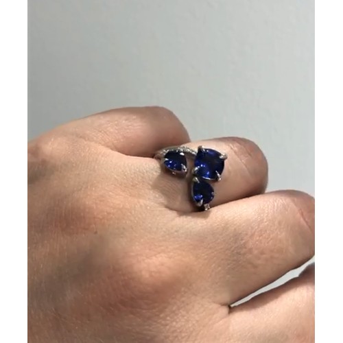 161 - Platinum custom made Ring with 3 Sapphire (3.02ct) and encrusted Diamonds, size O1/2 and weight 7.5g... 