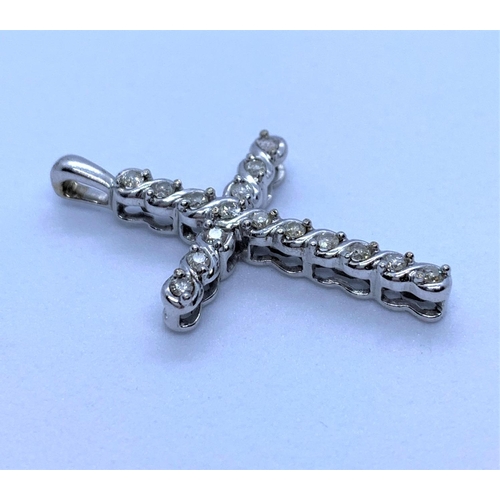 152 - Diamond Encrusted Cross in 10K White Gold, weight 1.5g