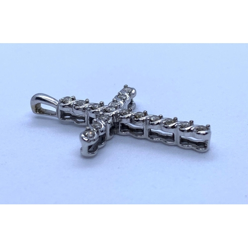 152 - Diamond Encrusted Cross in 10K White Gold, weight 1.5g