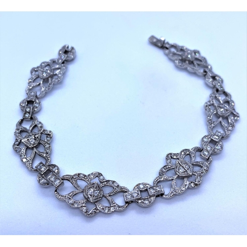 16 - Diamond Encrusted 18K White Gold Bracelet, weight 17.3g and 18cm long approx