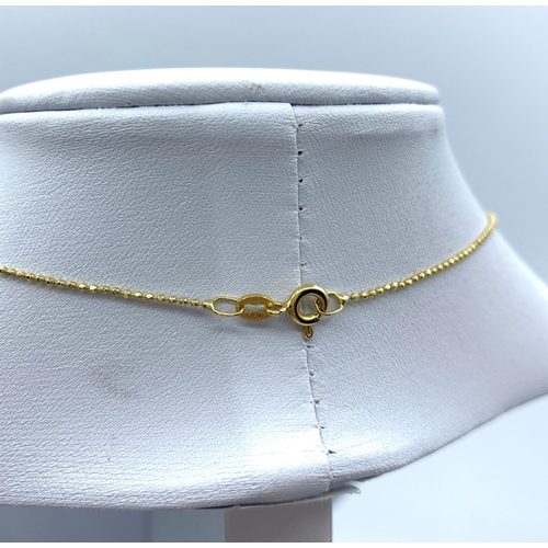 168 - Diamond Drop Pendant in 18K Gold on a 9K Gold Chain, weight 3.1g and 36cm long chain