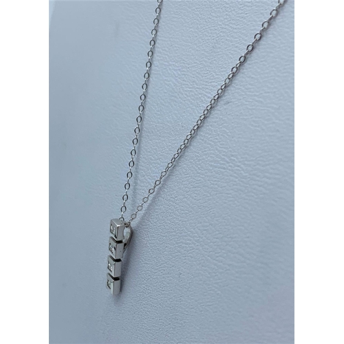 174 - Diamond Pendant (18K) on 9K Chain, weight 1.3g and 44cm long chain