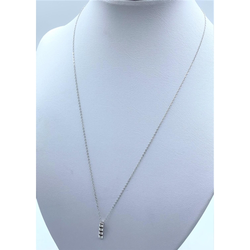 174 - Diamond Pendant (18K) on 9K Chain, weight 1.3g and 44cm long chain