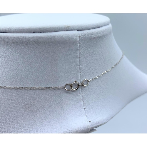 174 - Diamond Pendant (18K) on 9K Chain, weight 1.3g and 44cm long chain