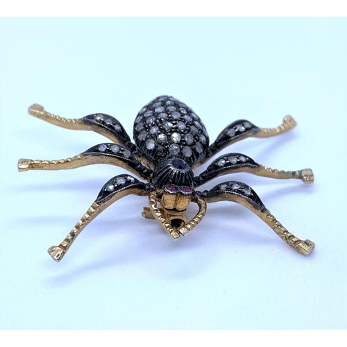 178 - Silver Gilt Spider Brooch encrusted with Diamonds and 2 Ruby Eyes, weight 5.6g