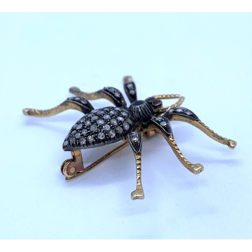 178 - Silver Gilt Spider Brooch encrusted with Diamonds and 2 Ruby Eyes, weight 5.6g