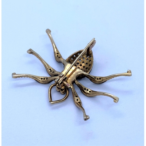 178 - Silver Gilt Spider Brooch encrusted with Diamonds and 2 Ruby Eyes, weight 5.6g