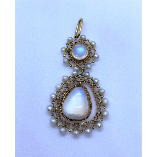 27 - Edwardian 18K Gold Pendant with Moonstones surrounded by Seed Pearls, weight 5.8g
The largest stone ... 