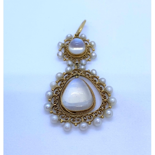 27 - Edwardian 18K Gold Pendant with Moonstones surrounded by Seed Pearls, weight 5.8g
The largest stone ... 