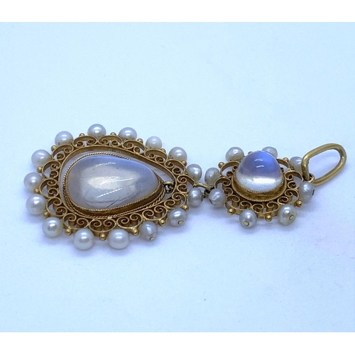 27 - Edwardian 18K Gold Pendant with Moonstones surrounded by Seed Pearls, weight 5.8g
The largest stone ... 