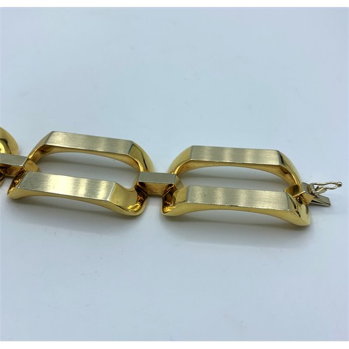 238 - 18ct White and Yellow Gold, Designer Bracelet. Weight 66.18g and 18cm long