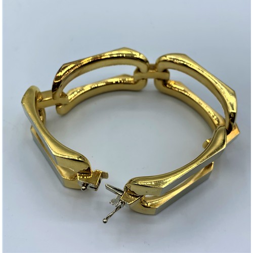 238 - 18ct White and Yellow Gold, Designer Bracelet. Weight 66.18g and 18cm long