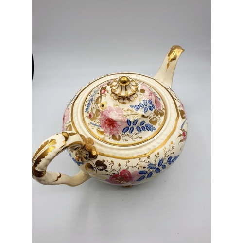 7 - H&R Daniel Fine Teapot and cover of 'Second Gadroon' Shape, painted with pink roses and bluebells in... 