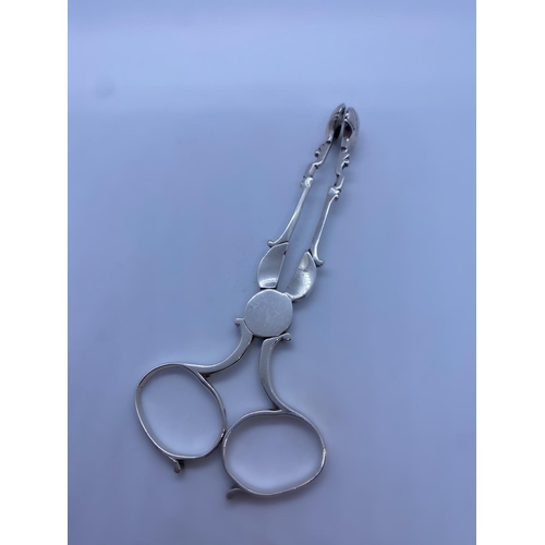 237 - A Pair of Georgian Silver Scissor Tongs with Shell Pincers, Maker Henry Plumpton, dating to c.1760, ... 