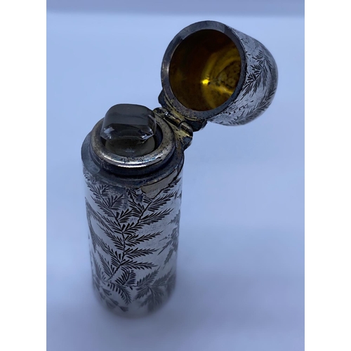 253 - 1882 Silver Scent Bottle with Bird and Woodland setting engraved, weight 34g and 6cm tall approx