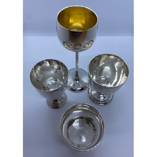 255 - 4x assorted Silver Cups, weight 154g (4)