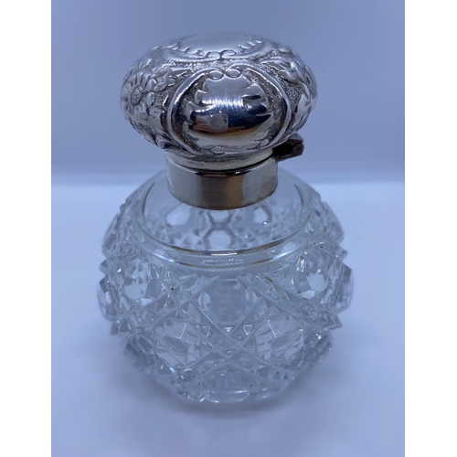 257 - Vintage Silver Top Bottle, weight 75g and 9cm tall approx