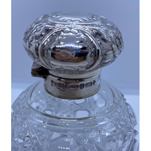 257 - Vintage Silver Top Bottle, weight 75g and 9cm tall approx