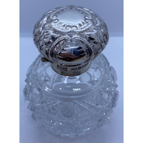 257 - Vintage Silver Top Bottle, weight 75g and 9cm tall approx