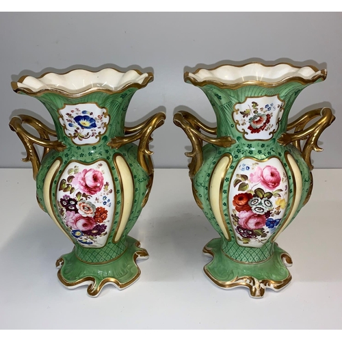 336 - Pair of Rococo style handled Urns in green with floral design to front and rear panels, 24cm tall (2... 