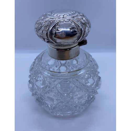 259 - Cut Glass Scent Bottle with Silver Top, weight 315g and 10cm tall