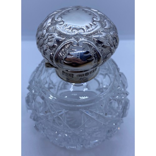 259 - Cut Glass Scent Bottle with Silver Top, weight 315g and 10cm tall