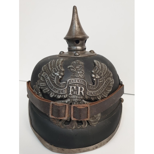 50 - WW1 Prussian 1915 Issue Pickelhaube. Nice markings for a Field Artillery unit then later re-issued t... 