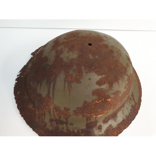 56 - WW1 Semi Relic British Brodie Helmet-may have been rimless? Remains of a letter “O” for the insignia... 