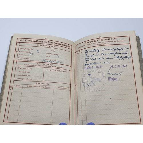 60 - WW2 German Wehrpass Book. With academic report for application to pilot school. Soldier was released... 