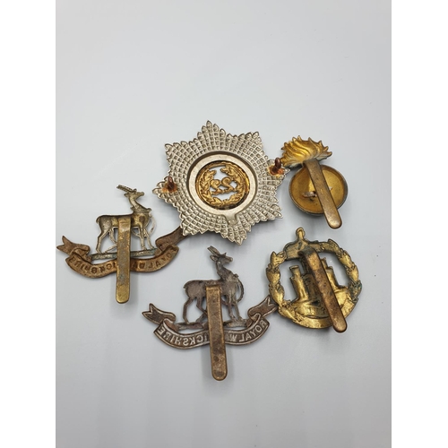 72 - 5 x British Infantry Cap Badges to include the Warwickshire ,Cheshire and Dorset regiments.