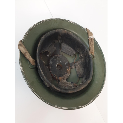 8 - WW2 British “Tommy” Helmet with the insignia of a Ghurkha unit, made by Harrison Bros & Howson circa... 