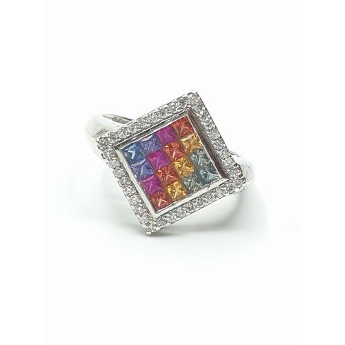 21 - Stone set 9ct White Gold Ring having various coloured gemstones to top of the square set mount, a di... 