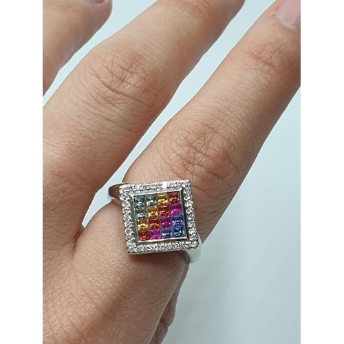 21 - Stone set 9ct White Gold Ring having various coloured gemstones to top of the square set mount, a di... 