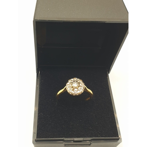 30 - Stone set 18ct Gold  Ring having a Diamond Centre stone with an 8 diamond circular surround, quality... 