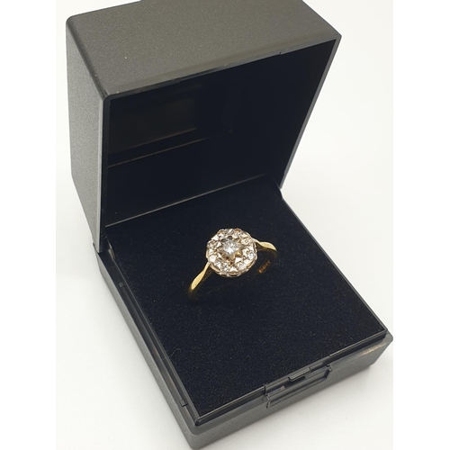 30 - Stone set 18ct Gold  Ring having a Diamond Centre stone with an 8 diamond circular surround, quality... 