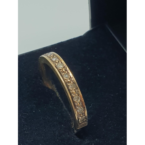 35 - 9CT Gold Half Eternity Ring having 9 Diamonds and gold beadwork to top, size N weight 3g approx