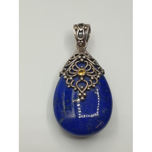 53 - Silver and Sodalite Pendant having a large Pear shaped Royal blue Sodalite stone in a typical Indian... 