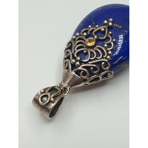 53 - Silver and Sodalite Pendant having a large Pear shaped Royal blue Sodalite stone in a typical Indian... 