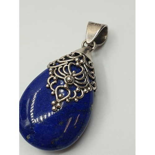 53 - Silver and Sodalite Pendant having a large Pear shaped Royal blue Sodalite stone in a typical Indian... 