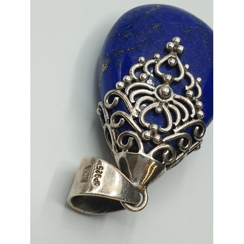 53 - Silver and Sodalite Pendant having a large Pear shaped Royal blue Sodalite stone in a typical Indian... 