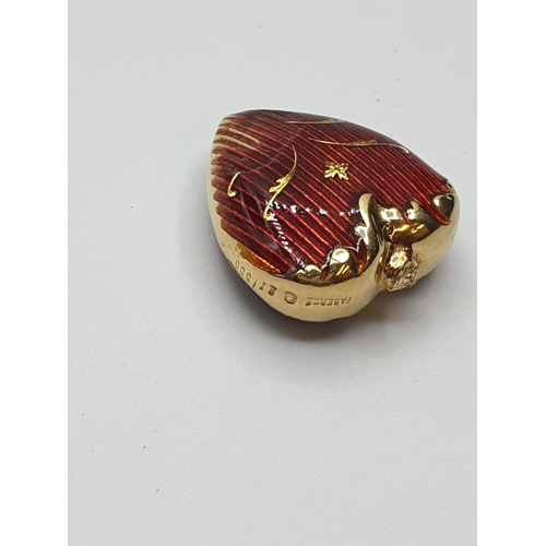 6 - A Rare Faberge Limited Edition 18 ct Gold pendant.Having red Guilloche Enamelling to sides . Clear m... 