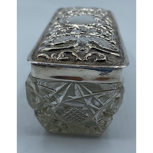 38 - Cut Glass Trinket Box with an ornate Silver Lid by Walker & Hall dated 1904, weight 233g and 14.5cm ... 