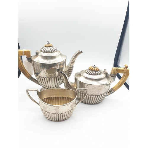 297 - Silver German made tea/coffee set comprising of teapot, coffee pot and sugar bowl made in 800 silver... 